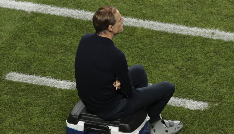 Paris Saint-Germain's German coach Thomas Tuchel sits on a cooler in the coach's area within the UEFA Champions League final football match between Paris Saint-Germain and Bayern Munich at the Luz stadium in Lisbon on August 23, 2020. (Photo by Manu Fernandez / POOL / AFP)